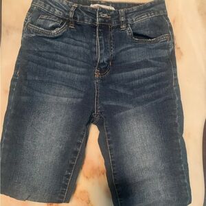 I am selling navy blue slightly distressed jeans!!